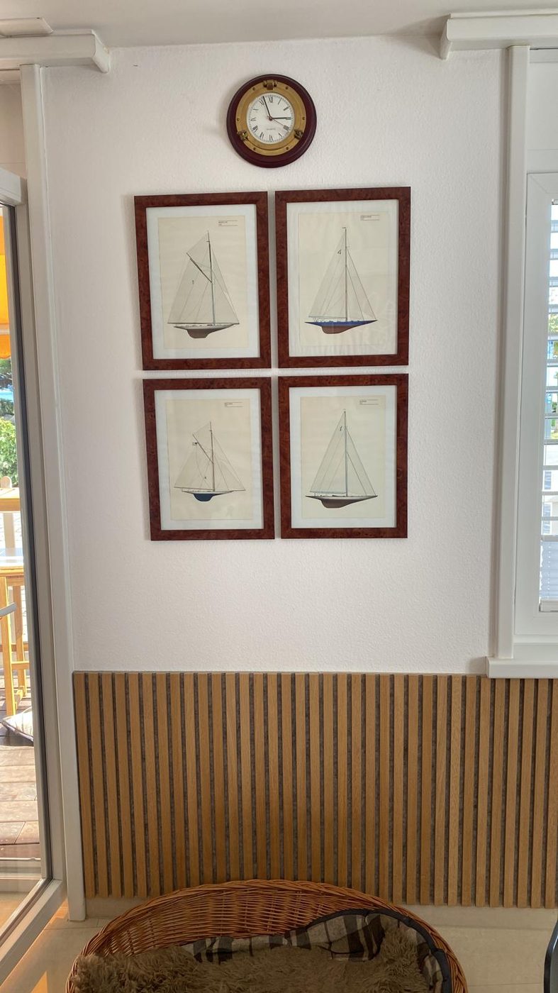 Pictures and clock mounted by Handy Man Mike